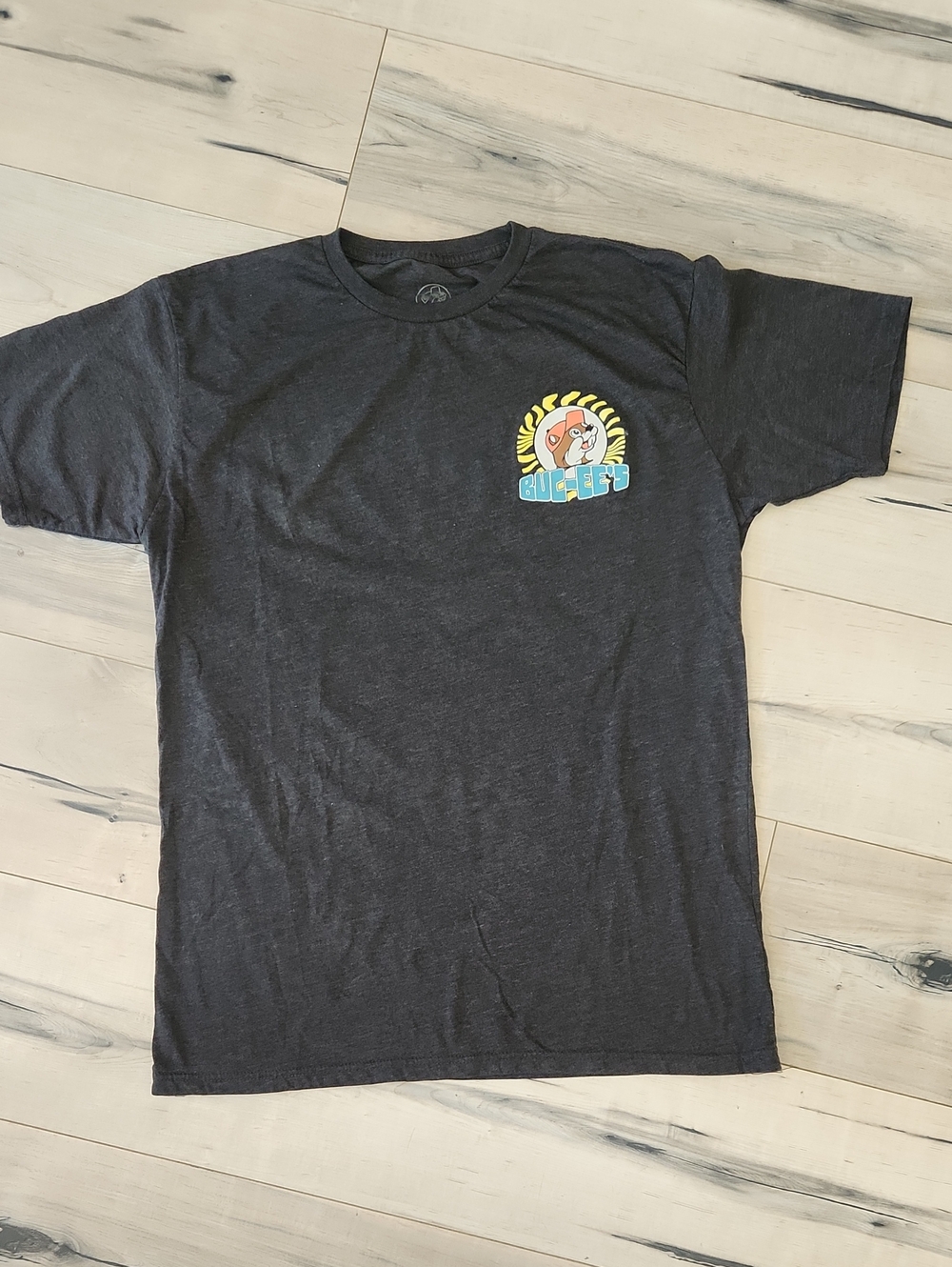 Graphic Black Tee with Colorful Chest Logo
